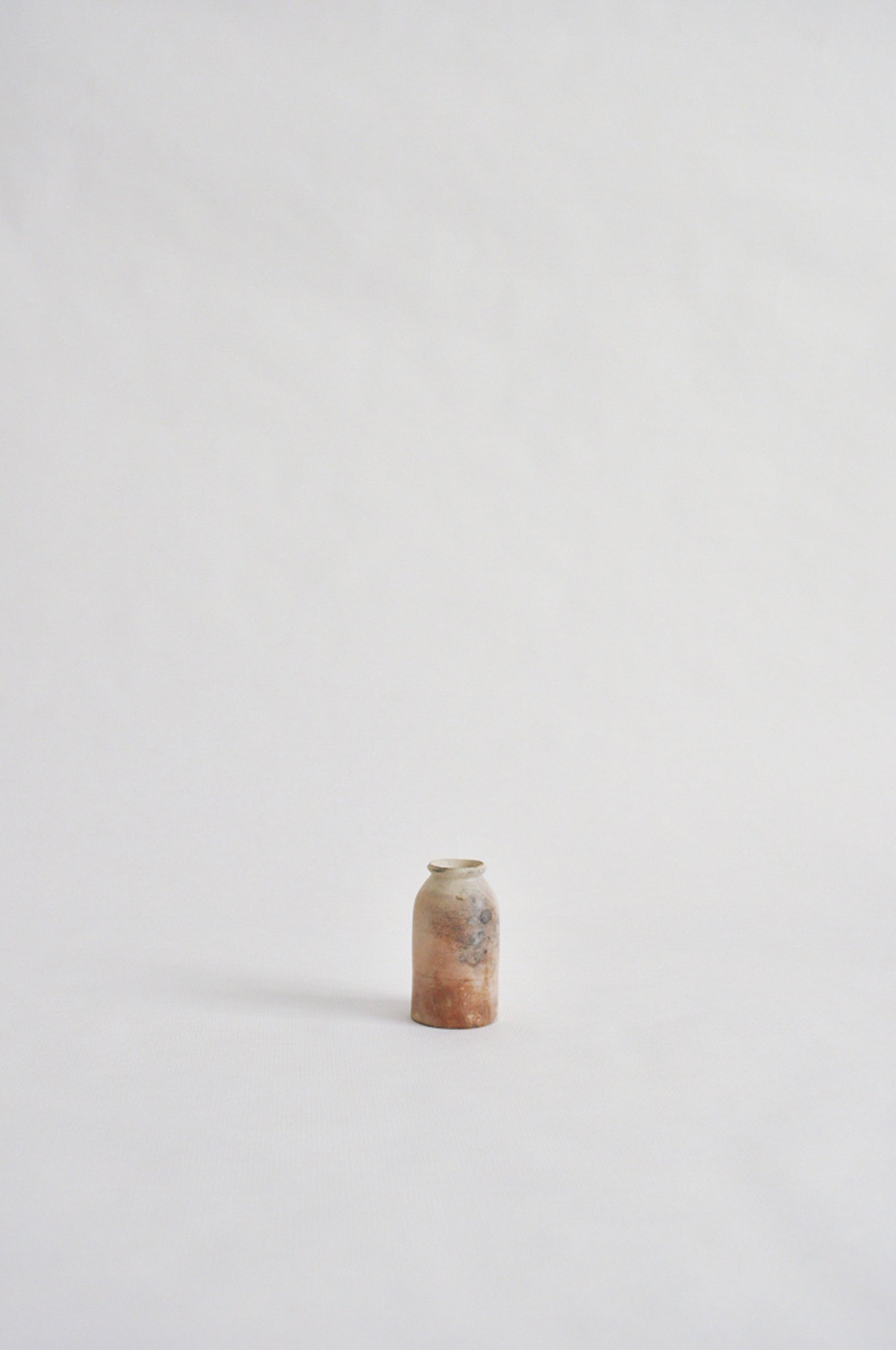 tiny wheel thrown vase, fired in a pit