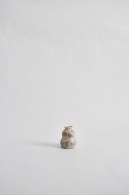 tiny wheel thrown vase, fired in a pit