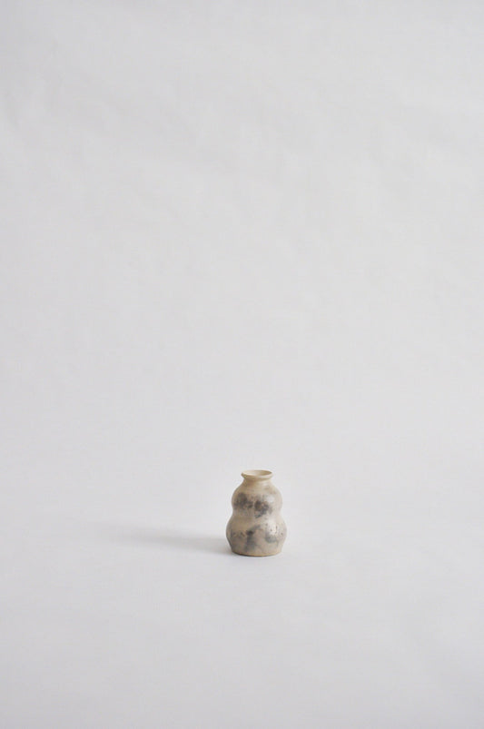 tiny wheel thrown vase, fired in a pit