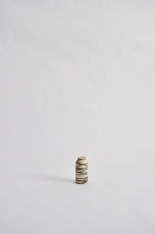 tiny wheel thrown vase, fired in a pit