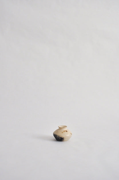 tiny wheel thrown vase, fired in a pit