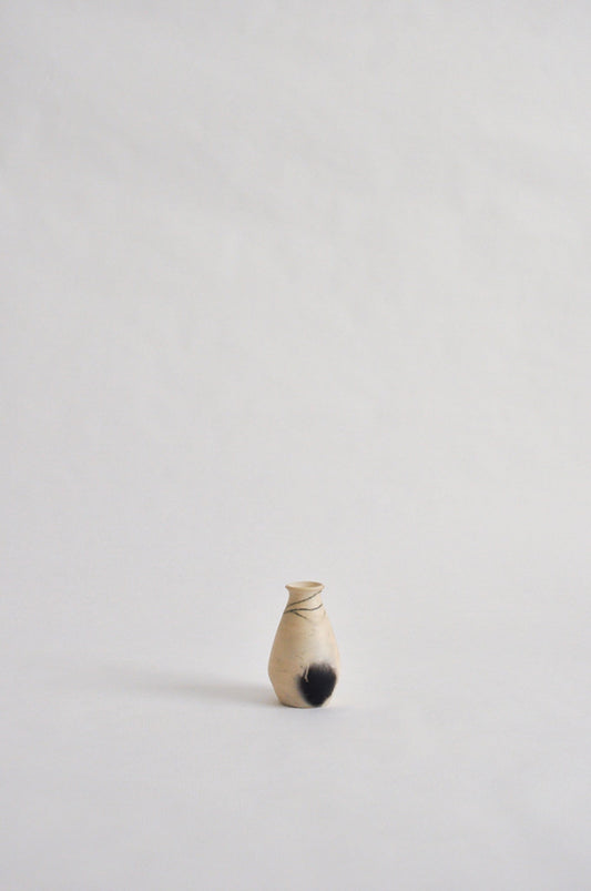tiny wheel thrown vase, fired in a pit