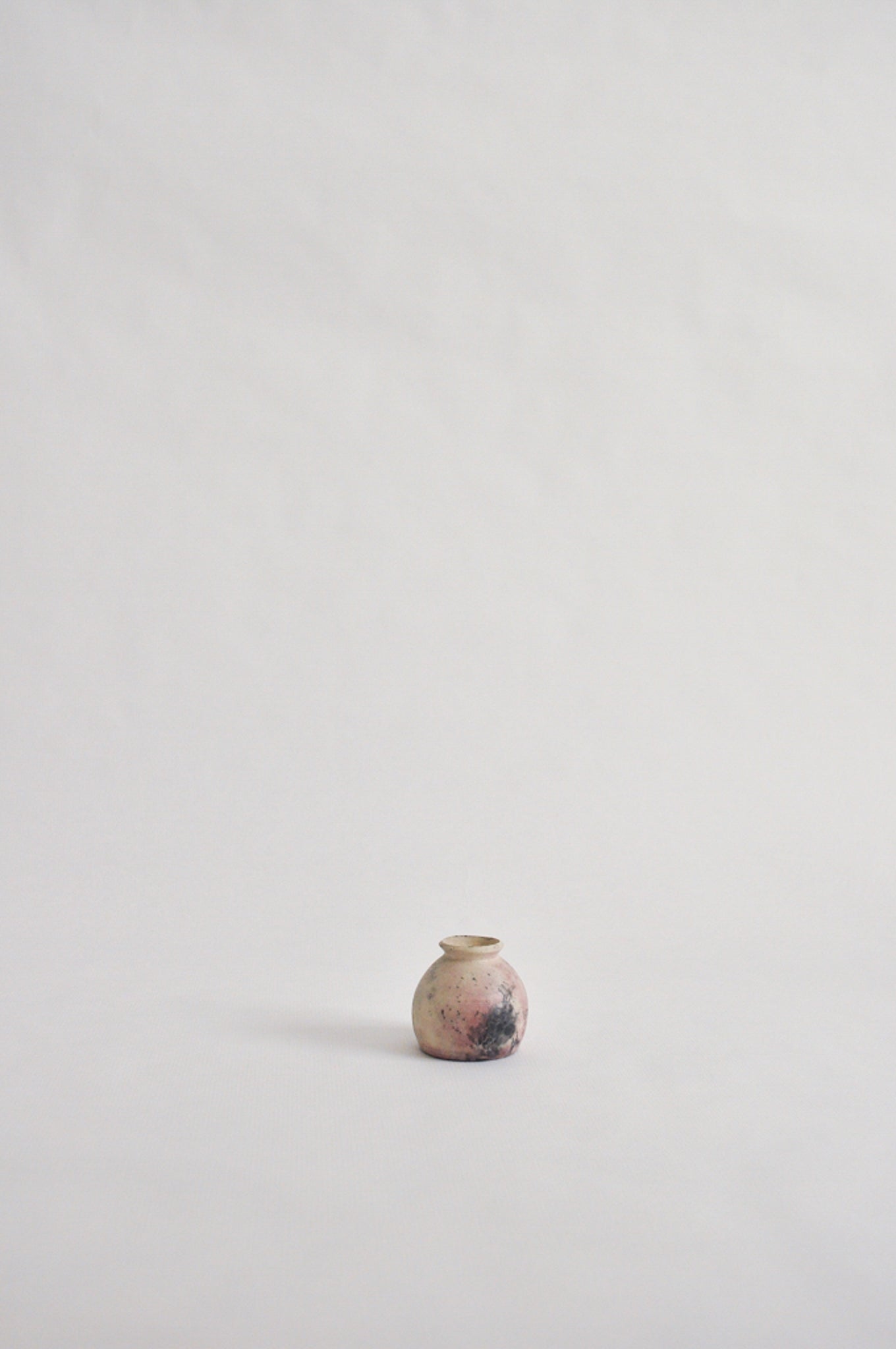 tiny wheel thrown vase, fired in a pit