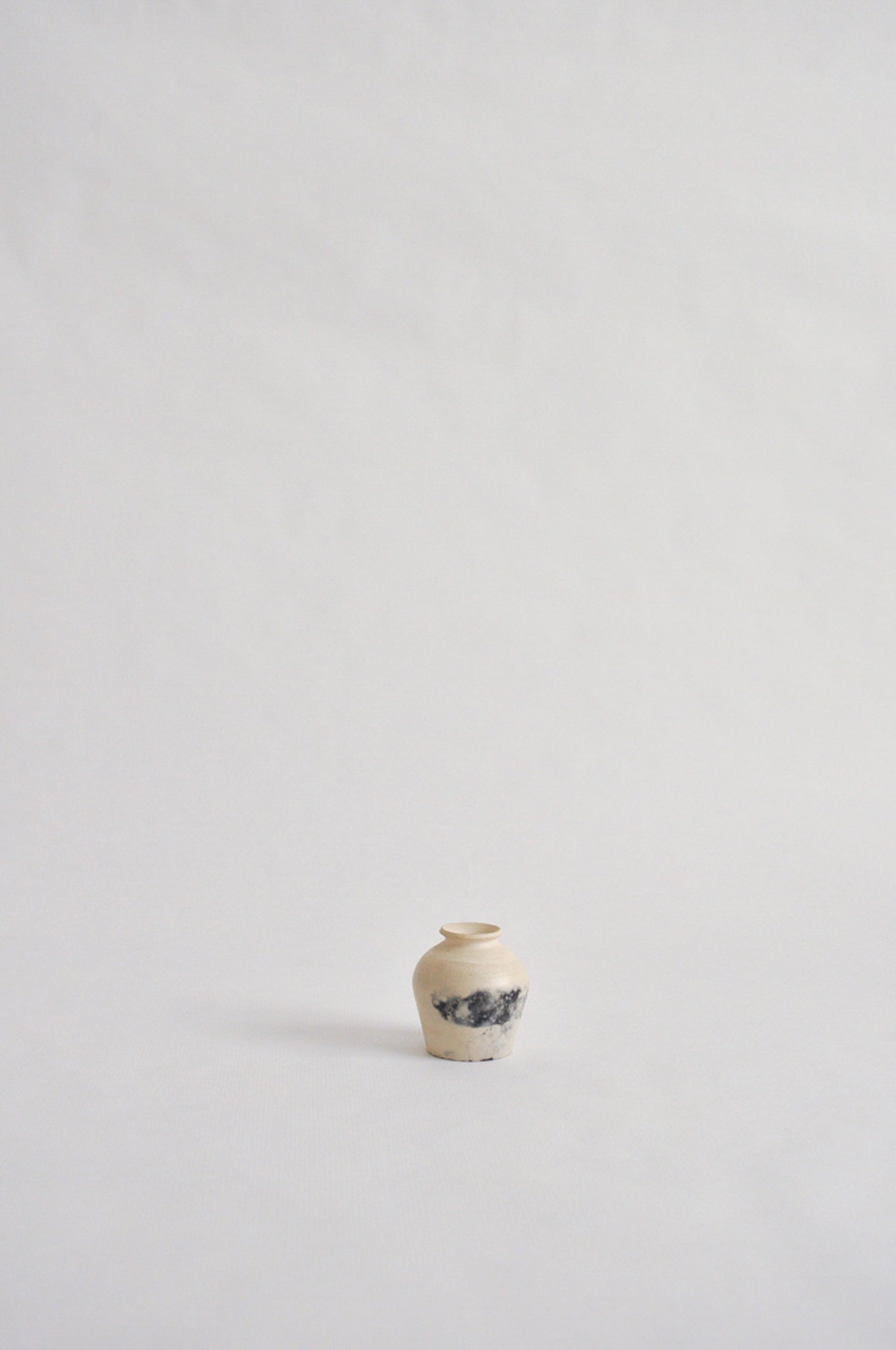 tiny wheel thrown vase, fired in a pit
