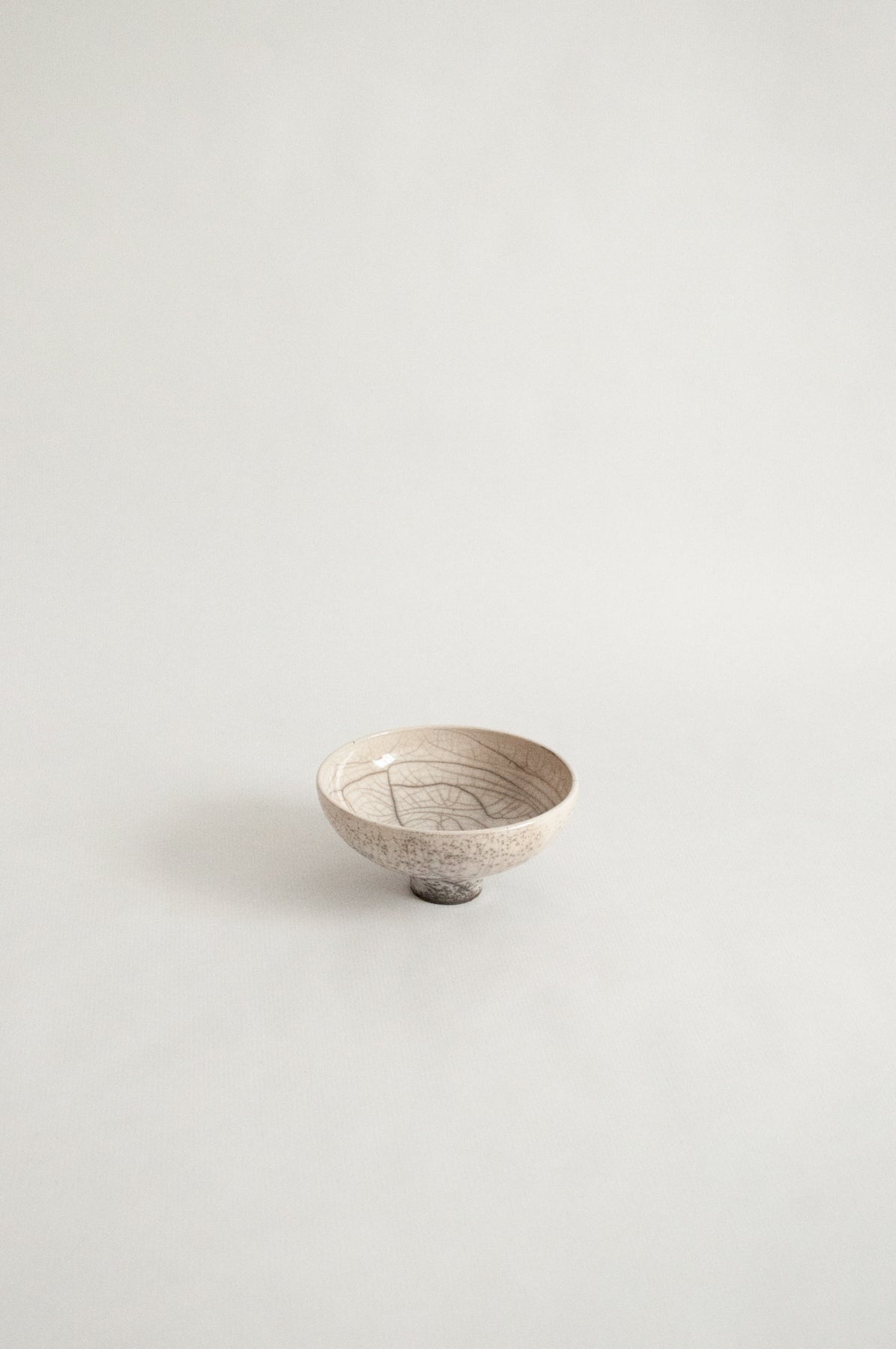 wheel-thrown, ivory craquelee, raku fired chawan